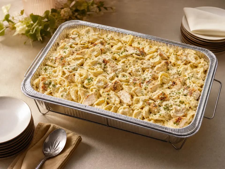 Chicken Tortelloni Alfredo (Serves 4–6) in the catering menu
